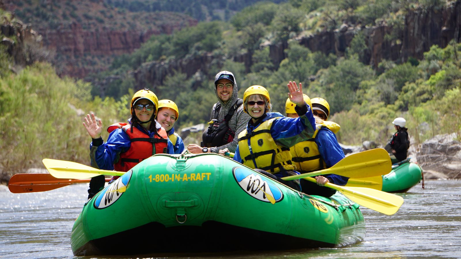 People in a green raft on the salt river near phoenix