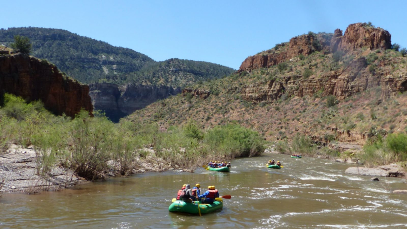rafts on the salt river with rock formations in the background