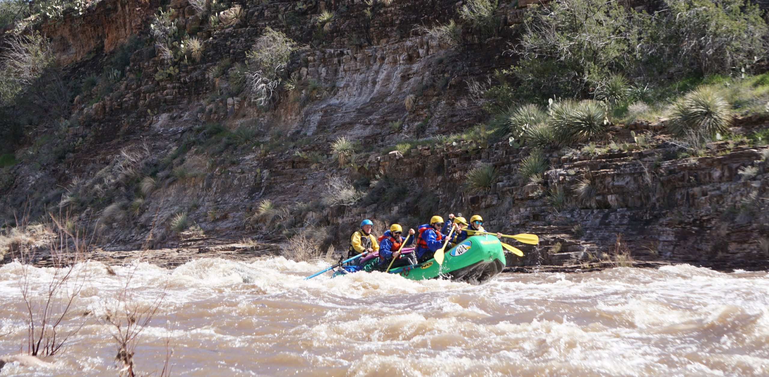 People in a green raft on the salt river