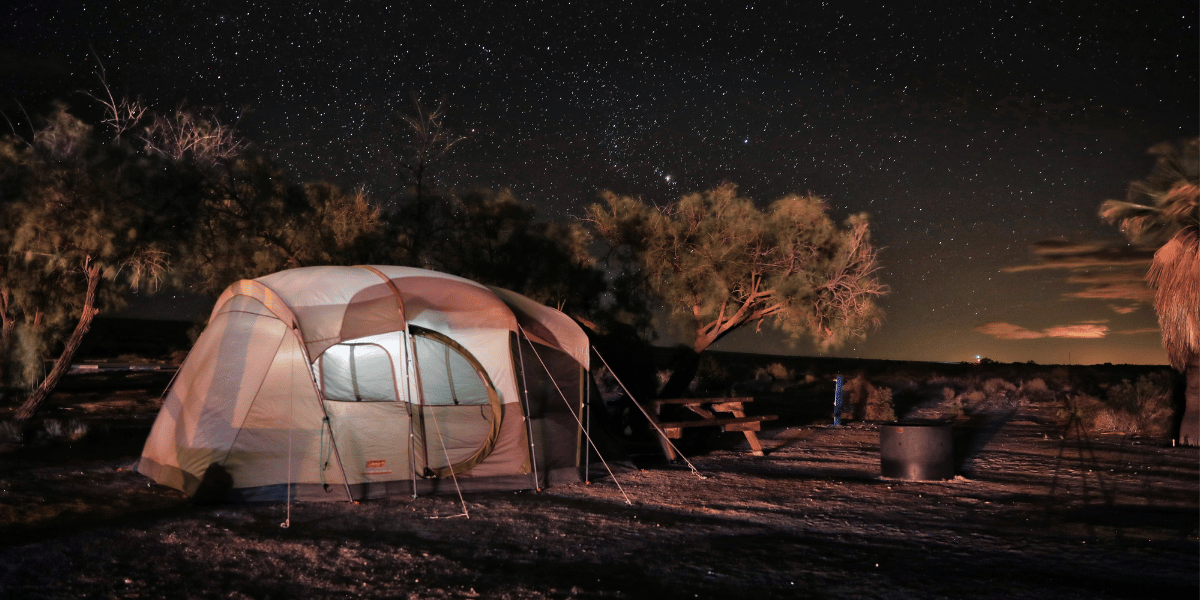 A tent under the starry skies while camping in arizona.