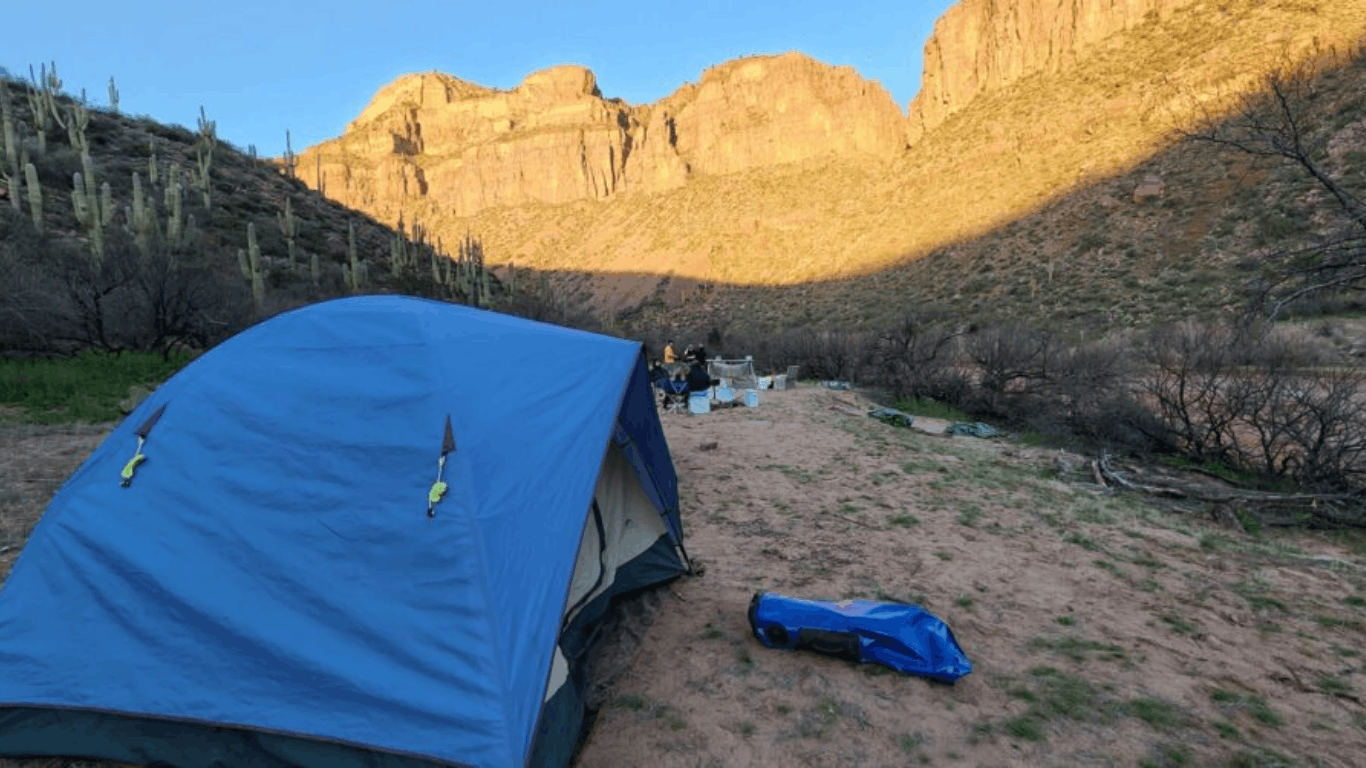 tent set up on the salt river on a multi-day rafting trip near phoenix
